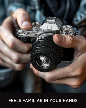 Nifeliz camera-model close-up showing grip and lens for tactile realism.