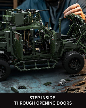 Nifeliz M-ATV open hood interior reveals cabin details for inspection.