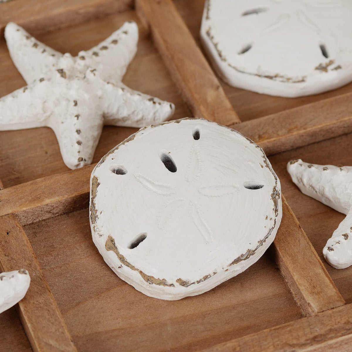 NIKKY HOME Beach Tic Tac Toe board in navy finish, complements nautical-themed interiors.