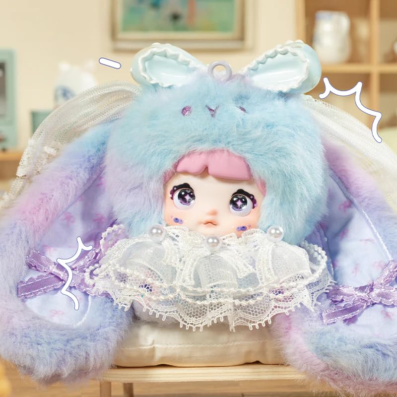 Nommi Bunny sized around 12 cm and placed on a desk.