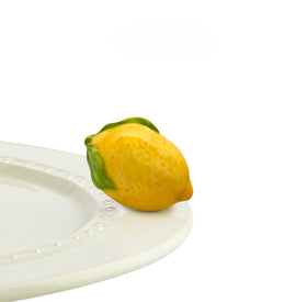Nora Fleming Lemon Squeeze Mini detail, hand-painted charm for festive table decor.