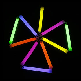 Novelinks glow sticks illuminated at a wedding for soft ambience.