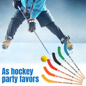 Noveread hockey party favors set displayed with pencils, balls, and bags.