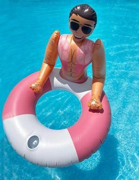 NPW Hunky Chad pool ring adds sunlit relaxation to pool days.