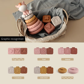 Nueplay soft stacking toys blocks with varied shapes to support early shape recognition.