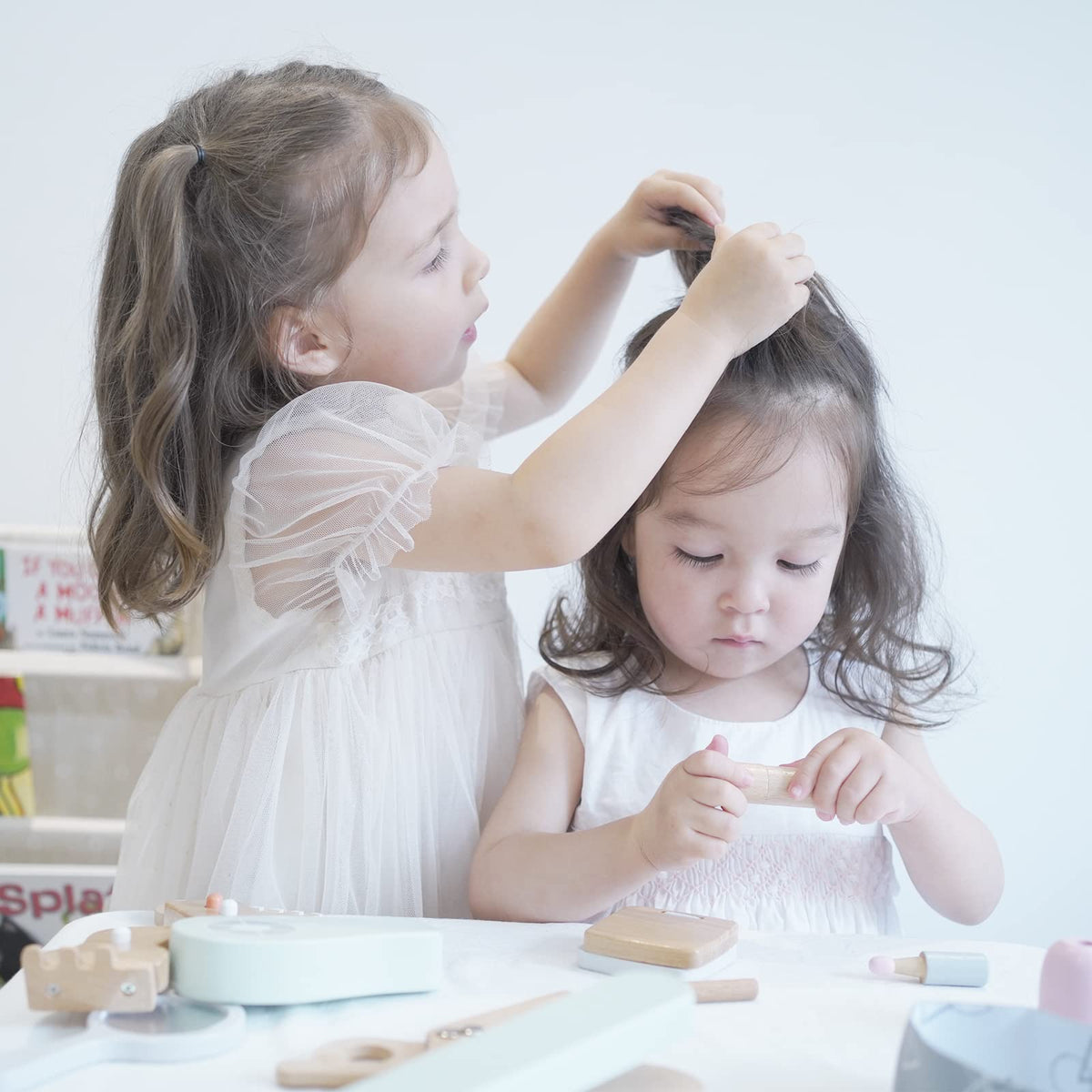 Nunukids hair dryer and scissors kit simulates salon-ready styling play.