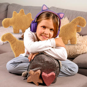 NXCHIZS dino nugget plush on couch, playful living room accent