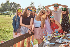 Ocean Line Luau sunglasses set arranges perfectly on a beach party backdrop.