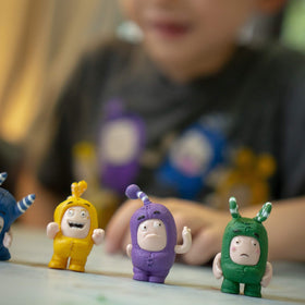 ODDBODS display-ready mini-figures set shines on a shelf.
