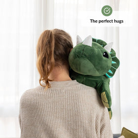 ODOXIA dinosaur lounging with child illustrates comfort during study or play.