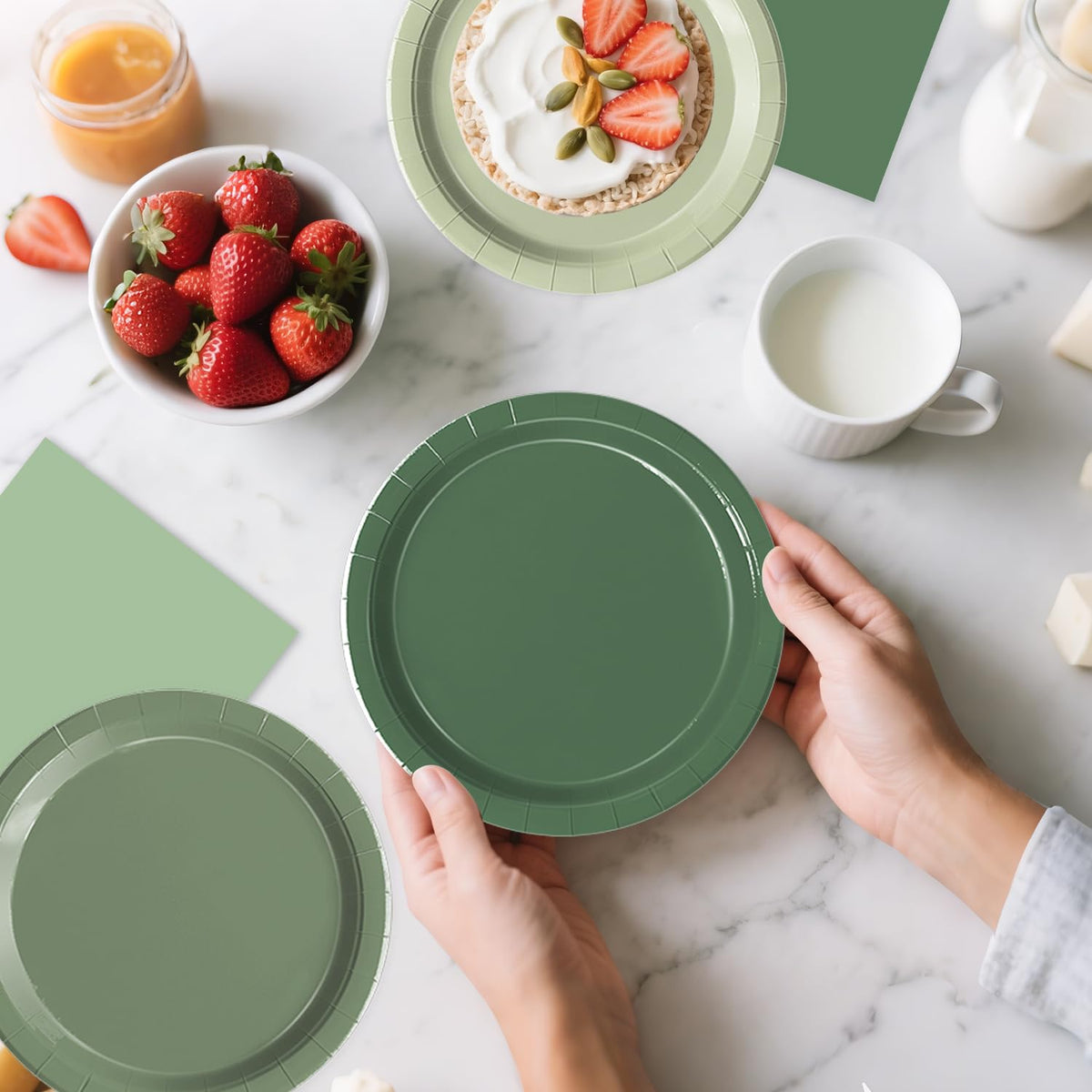 Oigco sage green disposable plates and napkins simplify hosting duties.