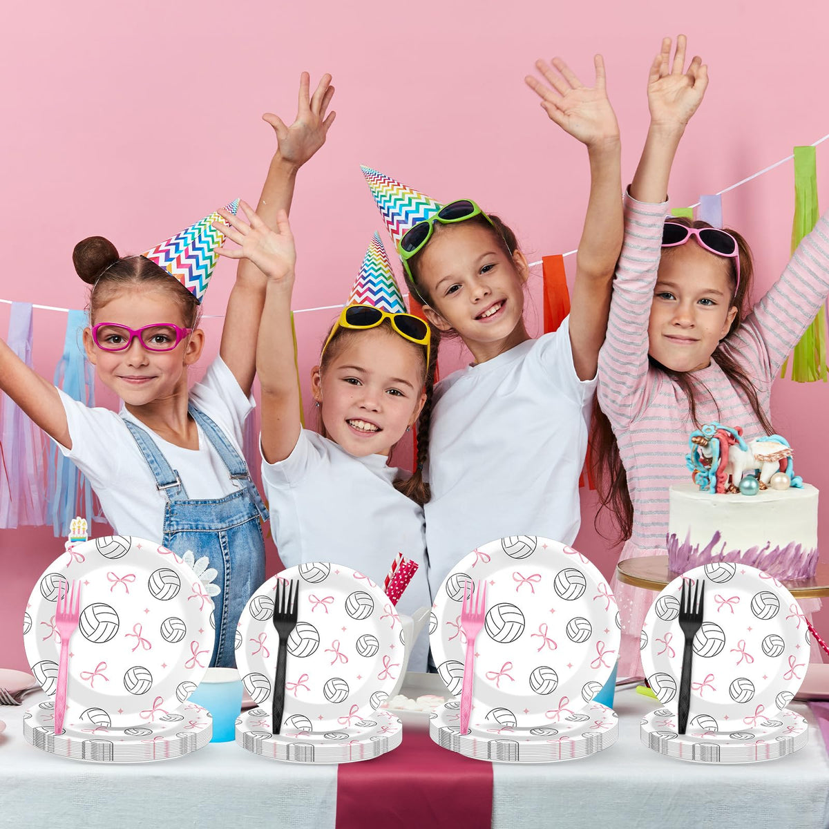 Oitnlaughter party table scene demonstrates coordinated set for kids and adults.
