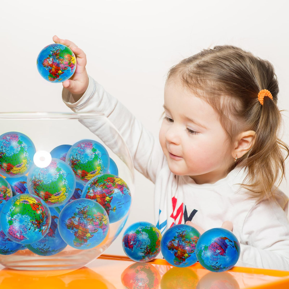 Oleitodh earth map ball close up highlighting squeezable foam texture