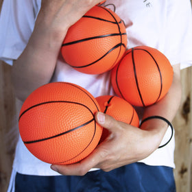 Oleitodh basketball with textured surface improves grip for easier shooting