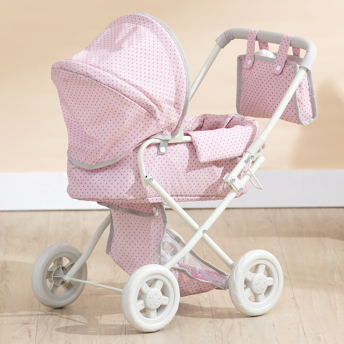 Olivia's Little World under-seat storage basket holds accessories during adventures.