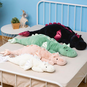 Ololele Little Weighted Dragon in a playroom decor setup