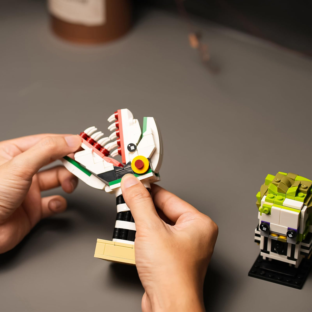 Onederbkk desk decor display – ghost and snake figures showcased
