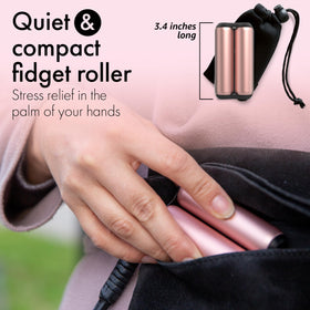 Closeup of ONO Roller in rose gold showing metallic finish and smooth contours.