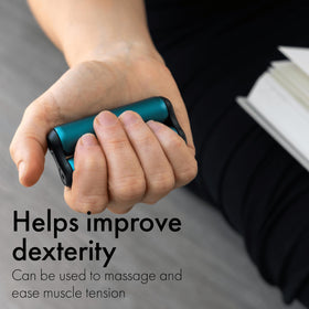 ONO Roller teal mini in hand demonstrates portable stress relief during work