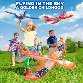 Onysurui LED glow glider plane in mid-air against blue sky