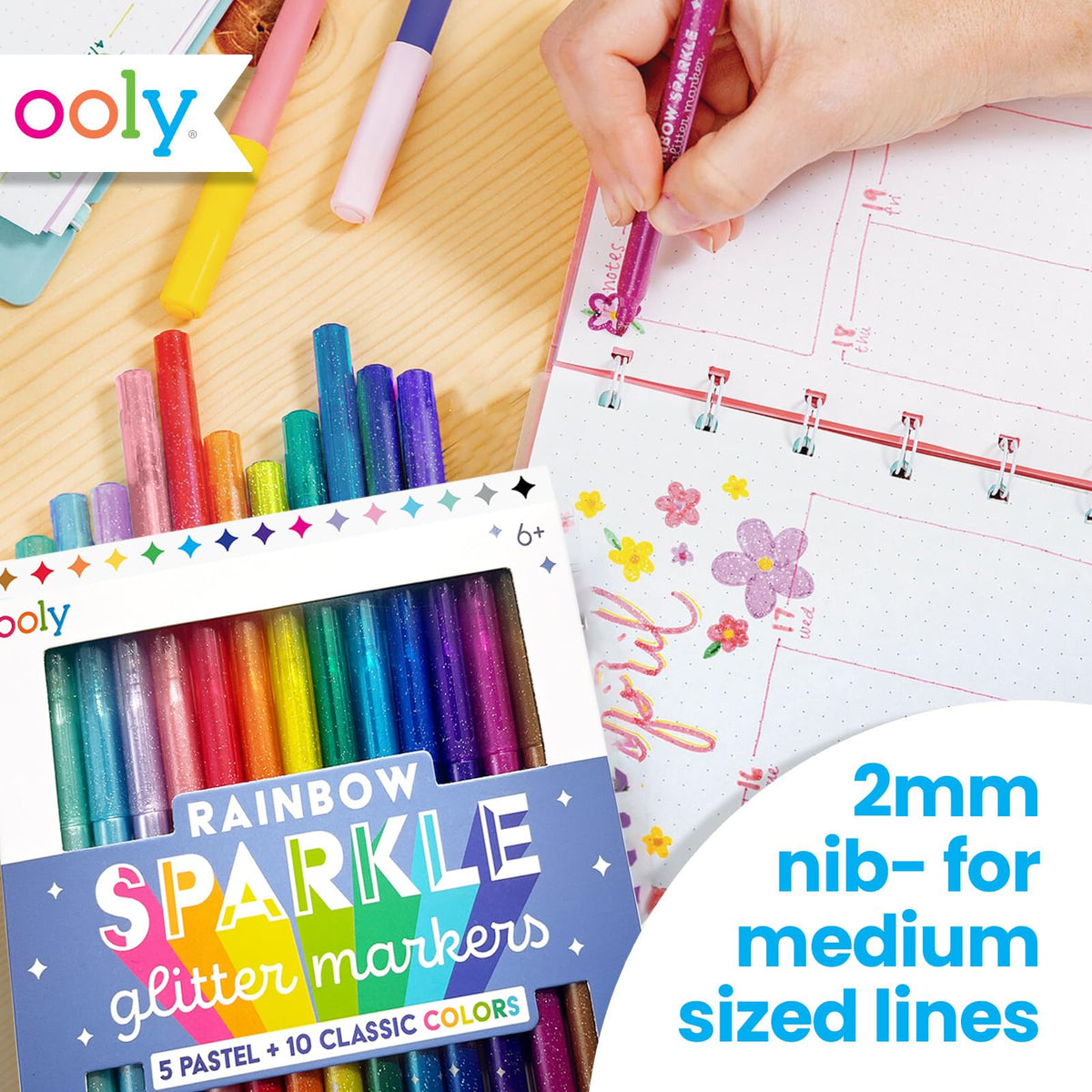 Ooly 2mm nib glitter markers for precise outlining.