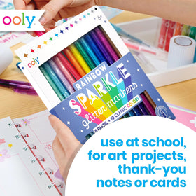 Ooly sparkle markers enhance journaling with shimmering accents.