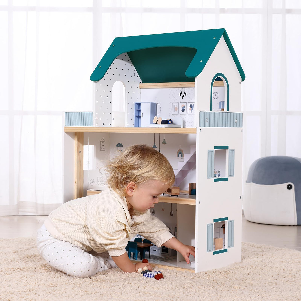 OOOK dollhouse exterior view shows sturdy wooden construction
