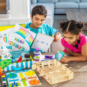 Open The Joy Feel Better Box contents featuring a versatile activity kit for quiet days at home.