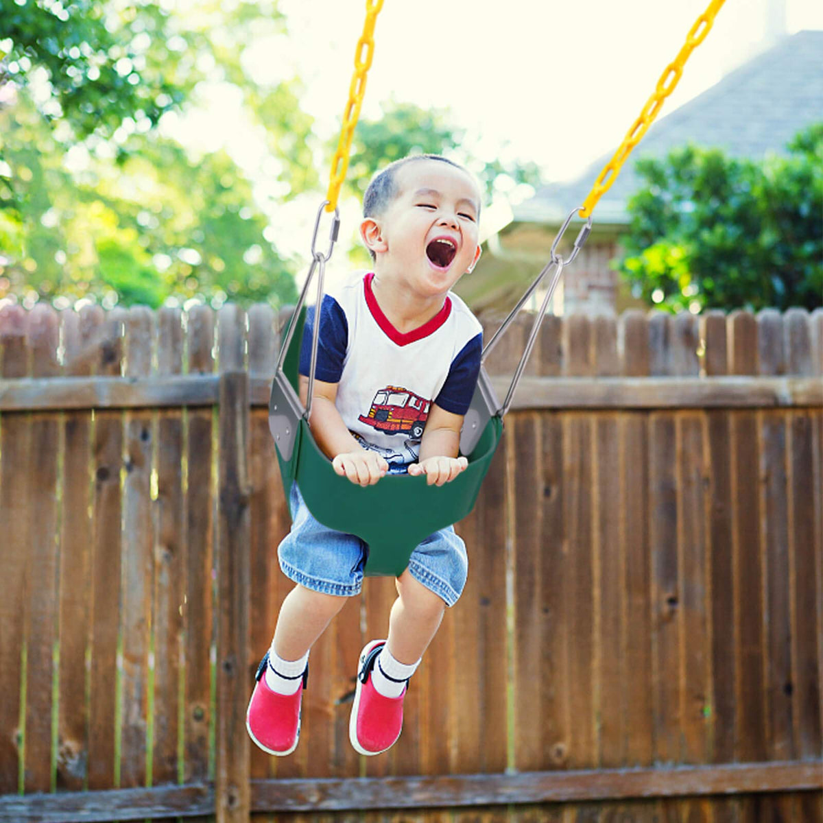 Orgrimmar toddler swing seat assembly image showing easy setup in a backyard.