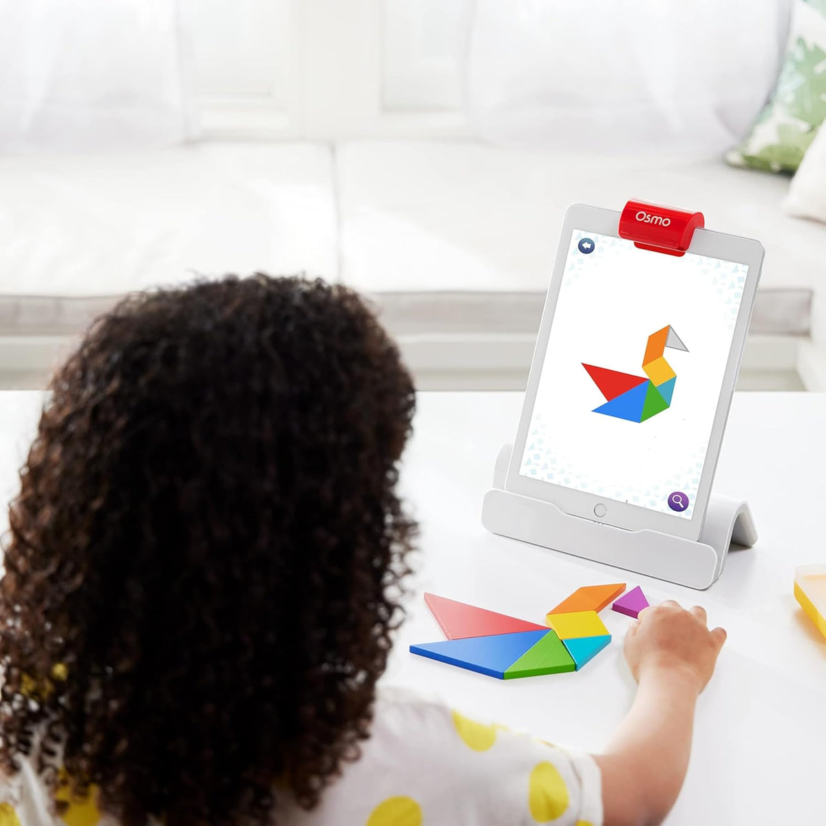 Osmo stackable storage keeps game pieces organized and accessible