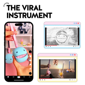 Otamatone Purple held in hand for quick, on-the-go musical creativity