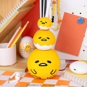 Otamatone Sanrio Gudetama portable music toy, ideal for camping or travel.