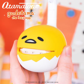 Otamatone Sanrio Gudetama side view, perfect for hands-on practice and simultaneous melodies.