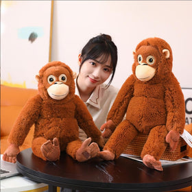 OUKEYI Punch Monkey plush side view highlights soft fur and portable cuddle buddy.