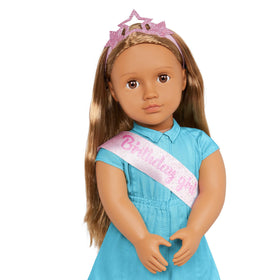 Our Generation Anita sparkly star headband adds festive pretend play.
