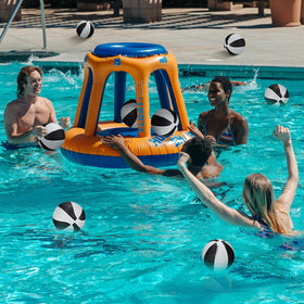 Outus basketballs floating in pool for water play.