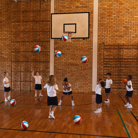 Outus junior-size balls support beginners practicing dribbling and shooting.