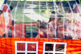 Color-coded poles on the Barnyard Playhouse simplify quick assembly and disassembly.