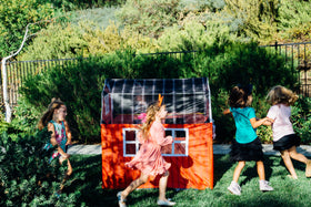 Durable 190T fabric on the Barnyard Playhouse stands up to repeated use.
