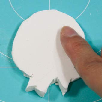 PADICO Air Dry Stone LA Doll Premix Sculpting demonstrates smooth carving for facial features.