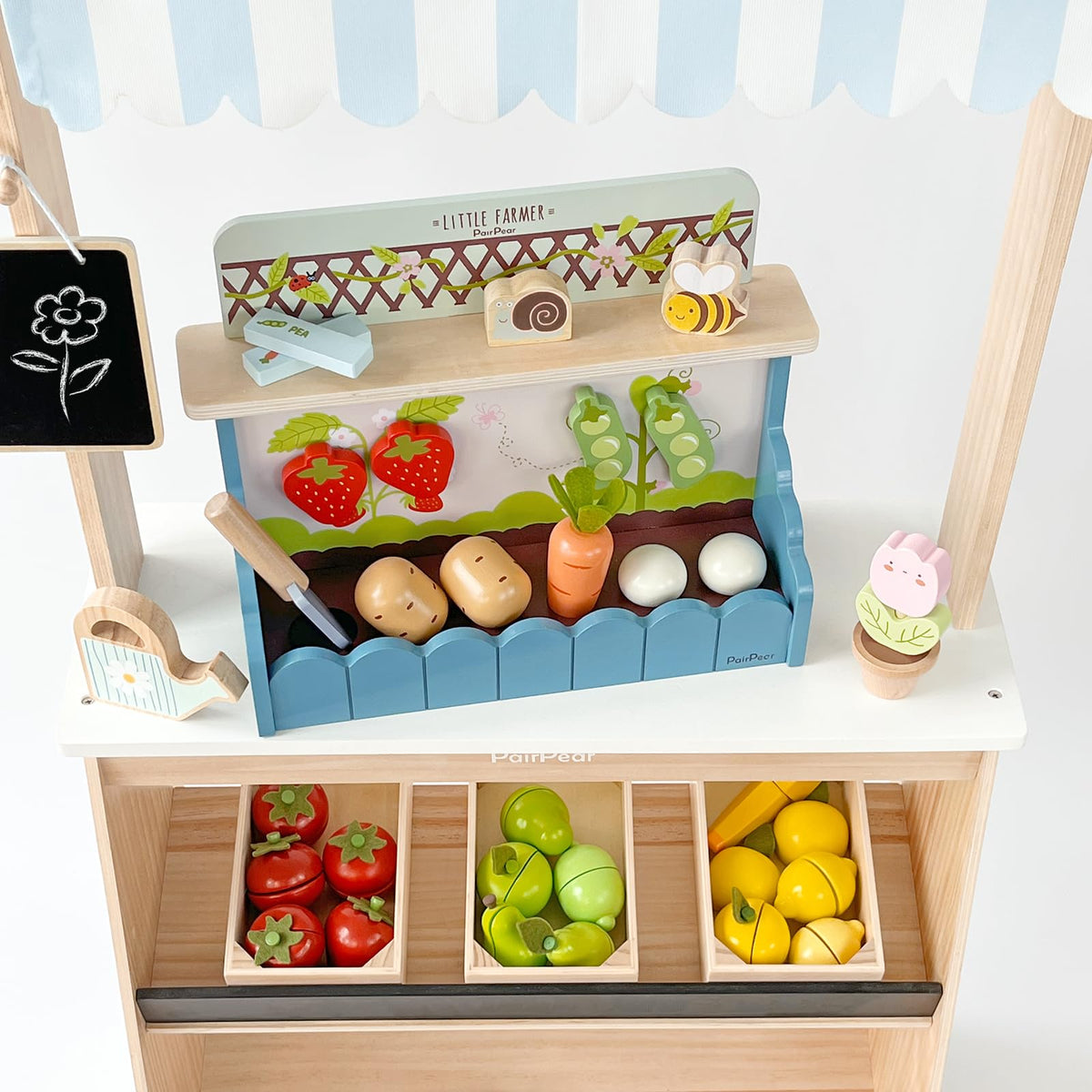 PairPear child engages in pretend-farm scene, inspiring imaginative play.