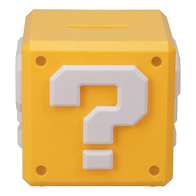 Paladone Super Mario Question Block money box used as bedroom decor.