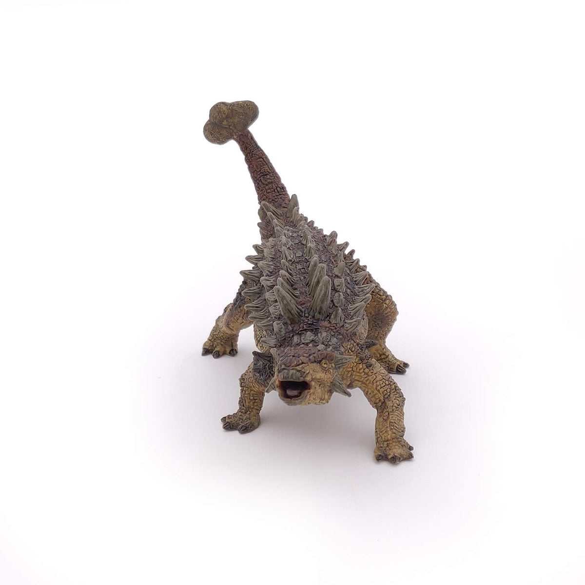 Papo Ankylosaurus hand-painted texture enhances color depth for lifelike display.