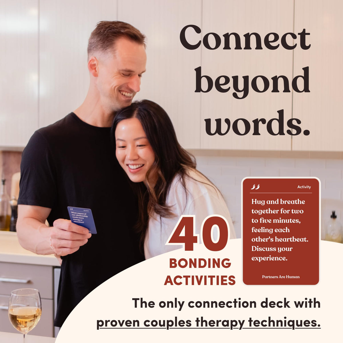 Couple enjoying a cozy evening with Partners Are Human cards for connection.