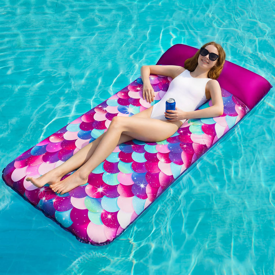 PARENTSWELL Mermaid Scales pool float with headrest for comfortable lounging in the sun.