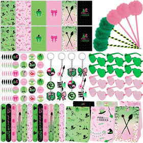 Party Greeting 84pc pink-green witch favors laid out for festive table decor