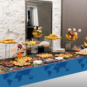 Party Greeting easy-cleanup tablecloth for indoor and outdoor events.