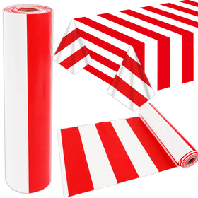Party Greeting red and white striped tablecloth roll covering large party tables with bold carnival style
