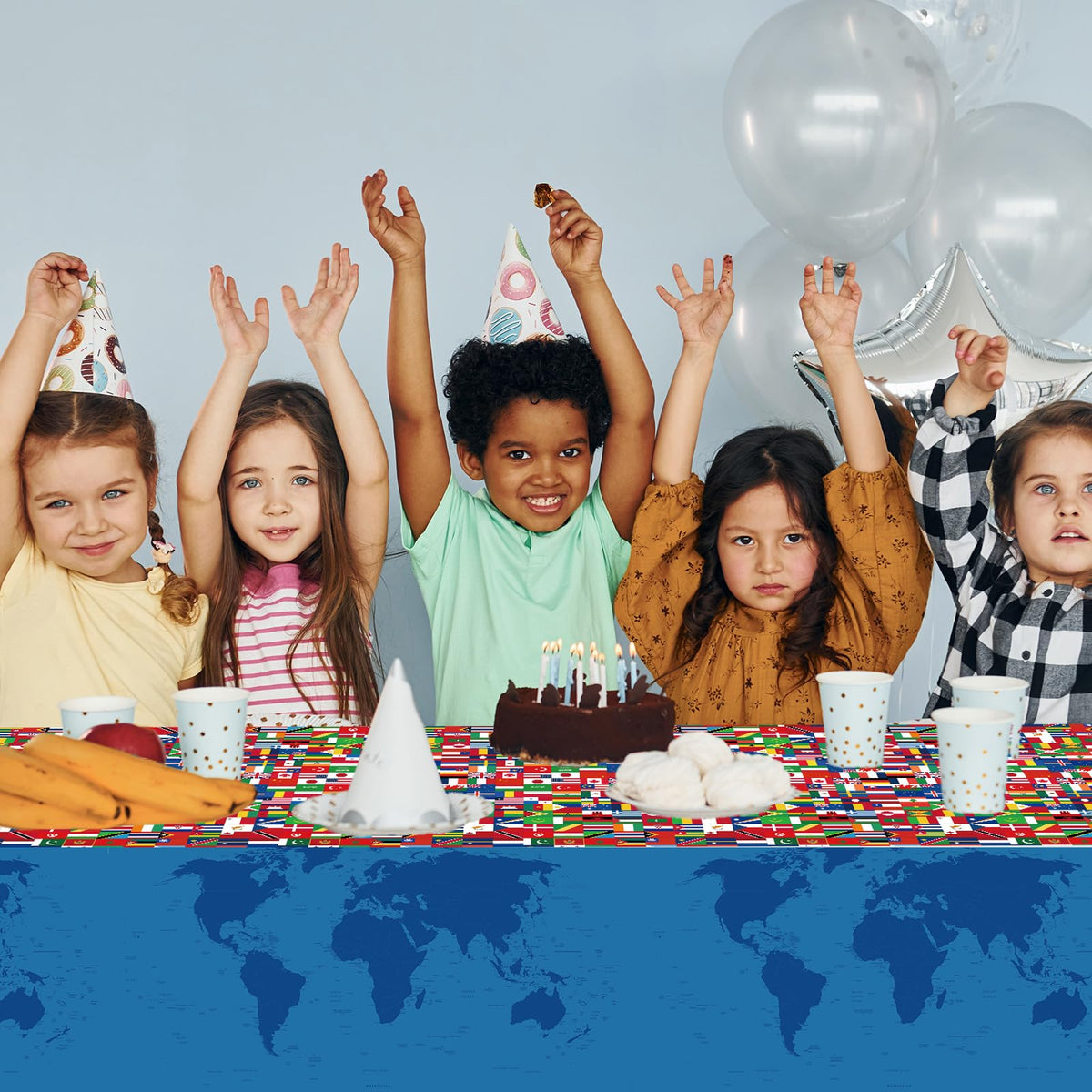 Party Greeting vibrant flag party decor tablecover complements banners and backdrops.