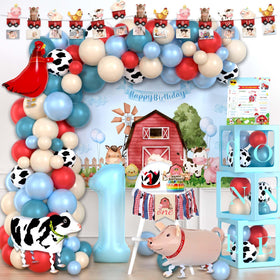 Party Inspo Farm banners show barn scene for festive first birthday decor.